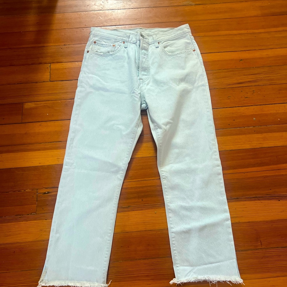 Levi’s 501 rigid denim size 31 x 26. They have a cute kick detail.  NWOT